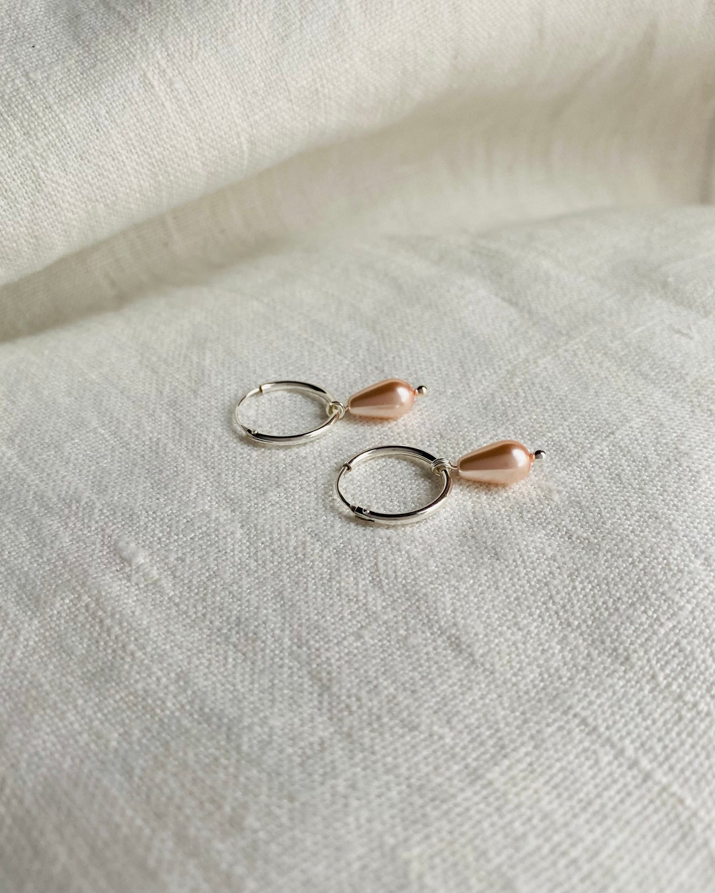 Hoop earrings with teardrop pearls, sterling silver