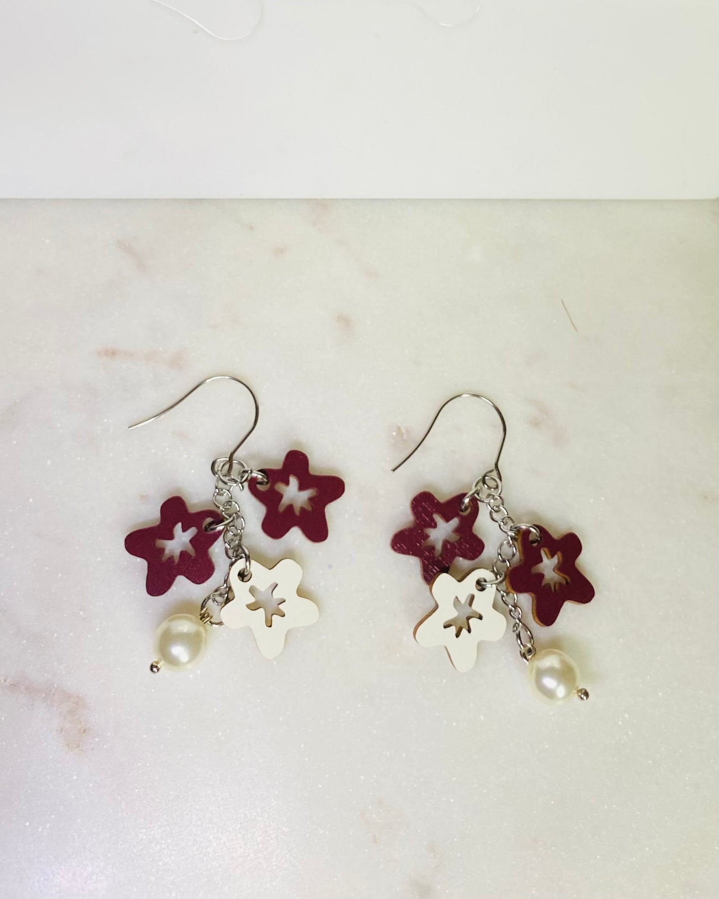 Little Flower Festoon earrings in a box