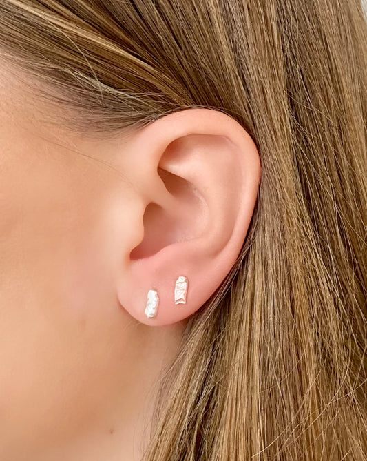 Cliff, stud earrings, asymmetrical pair